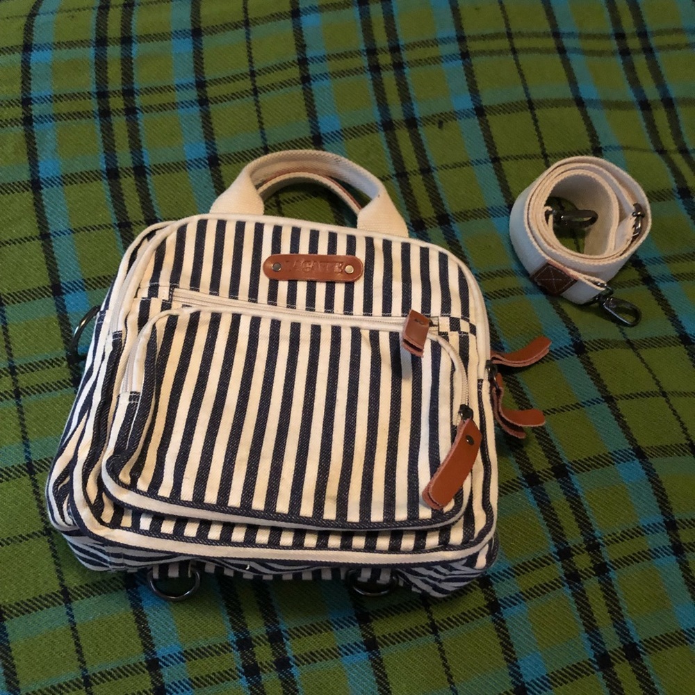 Multiple compartment crossbody backpack purse